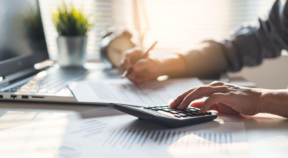 A man Working on taxes and tax planning for the year