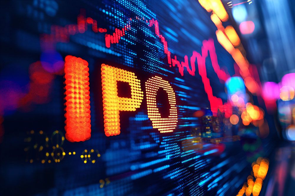 Bright digital stock board reading IPO in orange, with blue grid and red price charts.