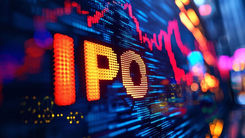 Bright digital stock board reading IPO in orange, with blue grid and red price charts.